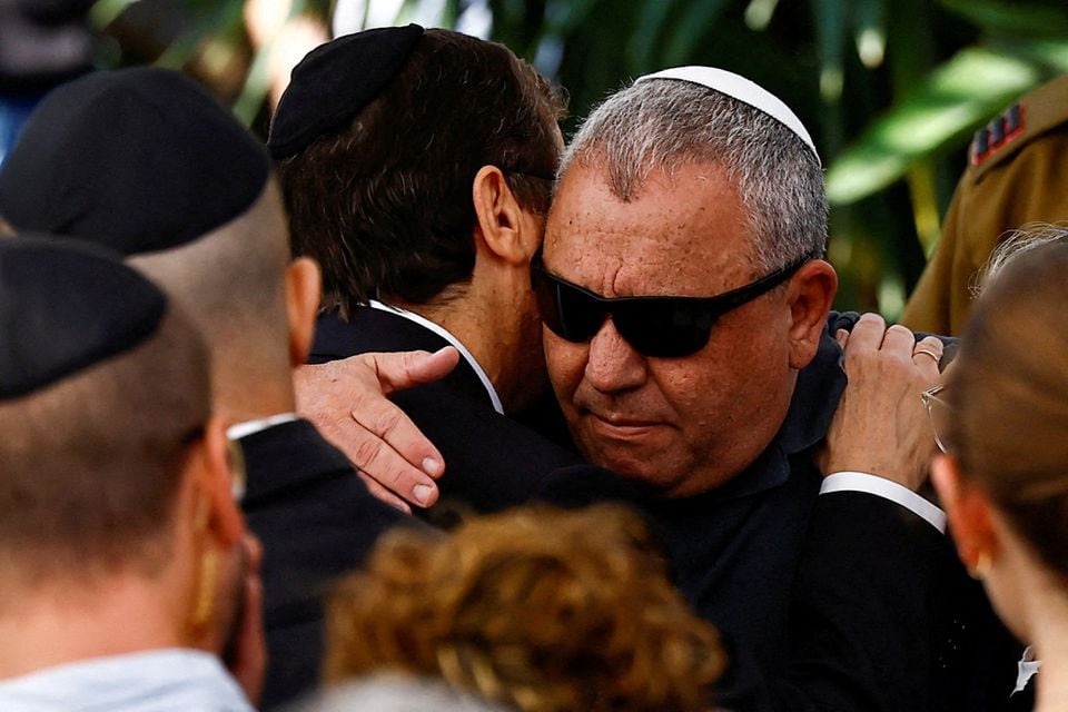 Israeli cabinet minister and former military chief Gadi Eizenkot is consoled by Israeli President Isaac Herzog, as he attends the funeral of his son Gal Meir Eisenkot, 25, an Israeli solider, who was killed in northern Gaza during the ongoing ground operation by Israel's military in the Gaza Strip, in Herzliya, Israel on December 8, 2023 — Reuters photo