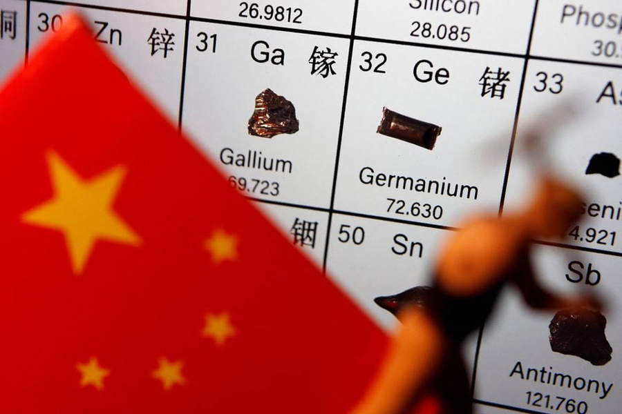The flag of China and a worker miniature are placed next to the elements of Gallium and Germanium on a periodic table, in this illustration picture taken on July 6, 2023.