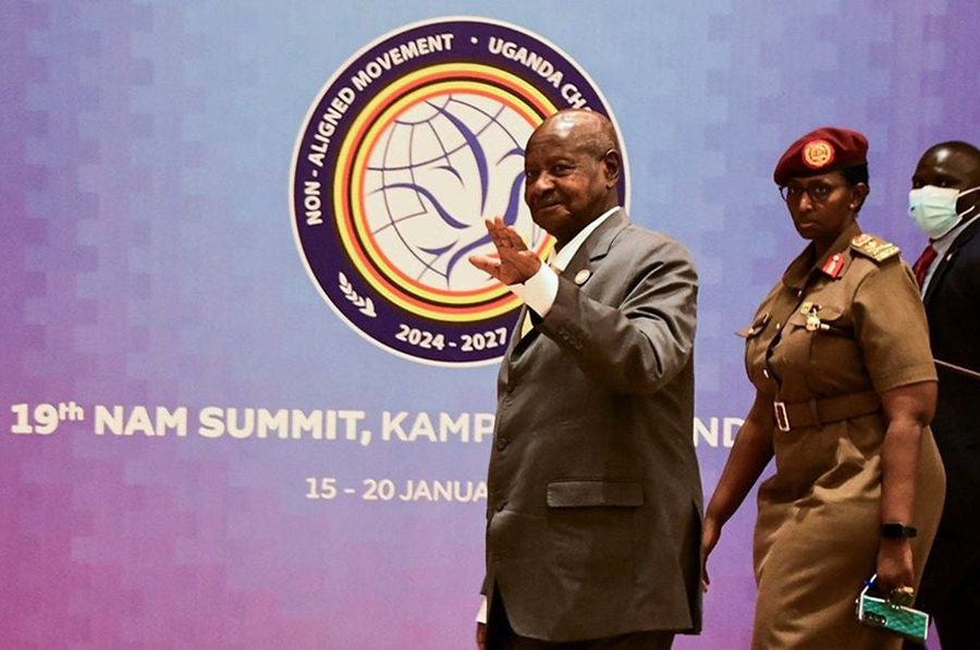 Uganda's President Yoweri Museveni walks to meet leaders from member countries of the Non-Aligned Movement (NAM) during the 19th summit, where several issues including global conflicts, climate change, UN reform and others are on the agenda for discussion, in Munyonyo suburb of Kampala, Uganda on January 20, 2024.