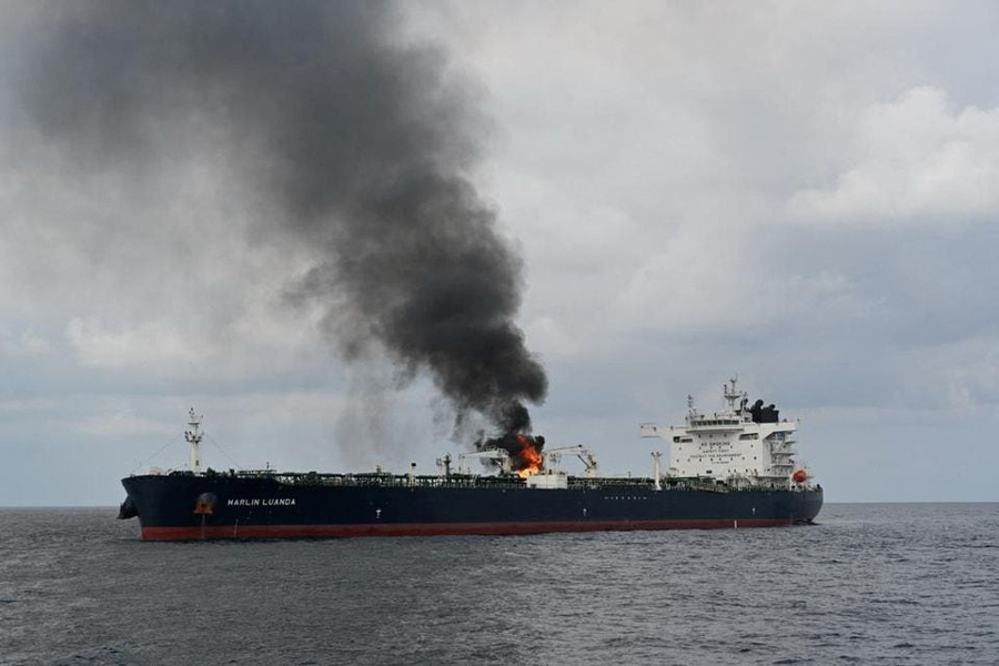 Smoke rises from Marlin Luanda, merchant vessel, after the vessel was struck by a Houthi anti-ship missile, at the location given as Gulf of Aden, in this handout picture released January 27, 2024.