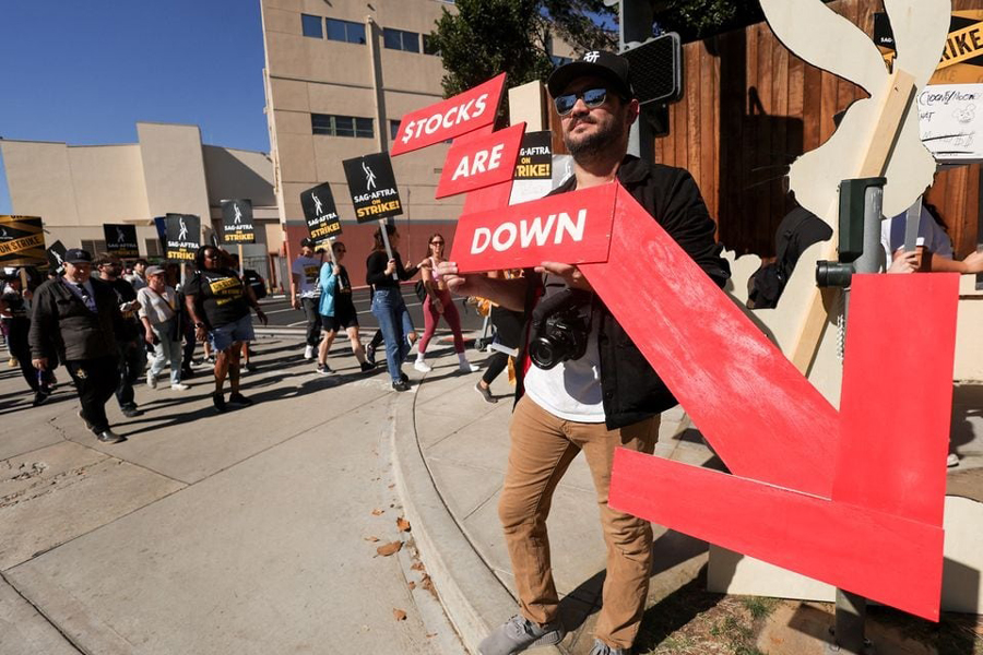 SAG-AFTRA members walk the picket line during their ongoing strike outside Disney Studios in Burbank, California, US, November 1, 2023.