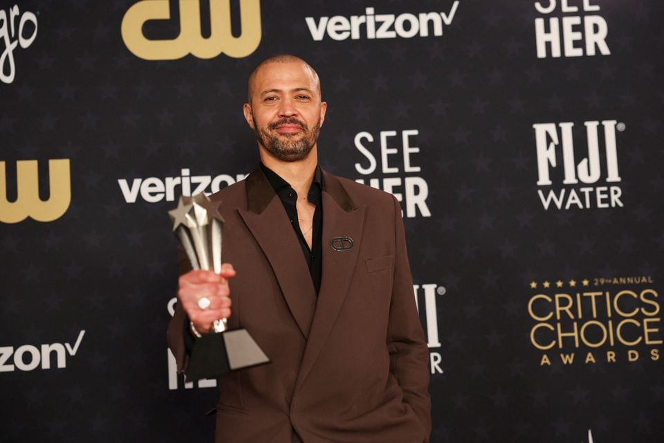 "American Fiction" actors Jeffrey Wright and Sterling K Brown and director Cord Jefferson hope the film's five Oscar nominations and its enthusiastic reception will help shift attitudes in Hollywood. Written by Jefferson, the comedy drama is based on Percival Everett's 2001 book "Erasure". It centres on Thelonious "Monk" Ellison, a professor and writer who is having no luck in publishing a new literary novel. But then he jokingly writes an outrageously stereotypical "Black" book out of spite - and it becomes an instant success. The film also had a successful launch, winning the People's Choice Award last September at the Toronto International Film Festival, where it made its debut. It is up for best film and best adapted screenplay Academy Awards, and Wright and Brown are nominated for best actor and best supporting actor Oscars. Composer Laura Karpman's score also received an Oscar nod. But getting the project off the ground was a challenge, said Jefferson, who makes his directorial debut with the movie. "A lot of people didn't want to finance it. We fortunately found wonderful partners who were able to make the movie with us, but most people we sent the movie to did not want anything to do with it," said Jefferson, whose writing credits include TV's "Watchmen" and "The Good Place". "Hopefully this will be a lesson, this will serve as sort of an example for Hollywood in the future when they're nervous about funding something that's a little bit different," Jefferson, 42, said. The movie uses humour to tackle themes of race, family trauma, loss and acceptance. Thelonious Ellison and his family battle their own issues while reckoning with the expectations placed on them as a Black family in America. Ellison's experiences resonated with Wright. But while the actor said he didn't find what the character goes through rare, seeing his journey portrayed on screen was less common. "That's what the film is partly about, is that there's a whole range of experiences, Black experiences that are outside of the narrow confines of what we're often fed," he said. "Let's recognise the breadth of the range of the Black experience, and we may find that, you know, it's just like any other experience.