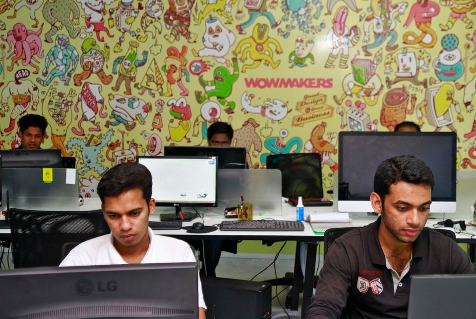 Design artists work on their computer terminals at the Start-up Village in Kinfra High Tech Park in the southern Indian city of Kochi on October 13, 2012 — Reuters/File