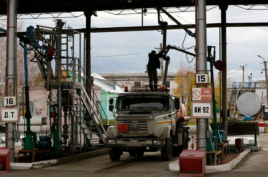 A gasoline tank truck is seen at a fuel station on the territory of the Krasnoyarsknefteproduct oil product company in Krasnoyarsk, Siberia on October 10, 2014 — Reuters/File