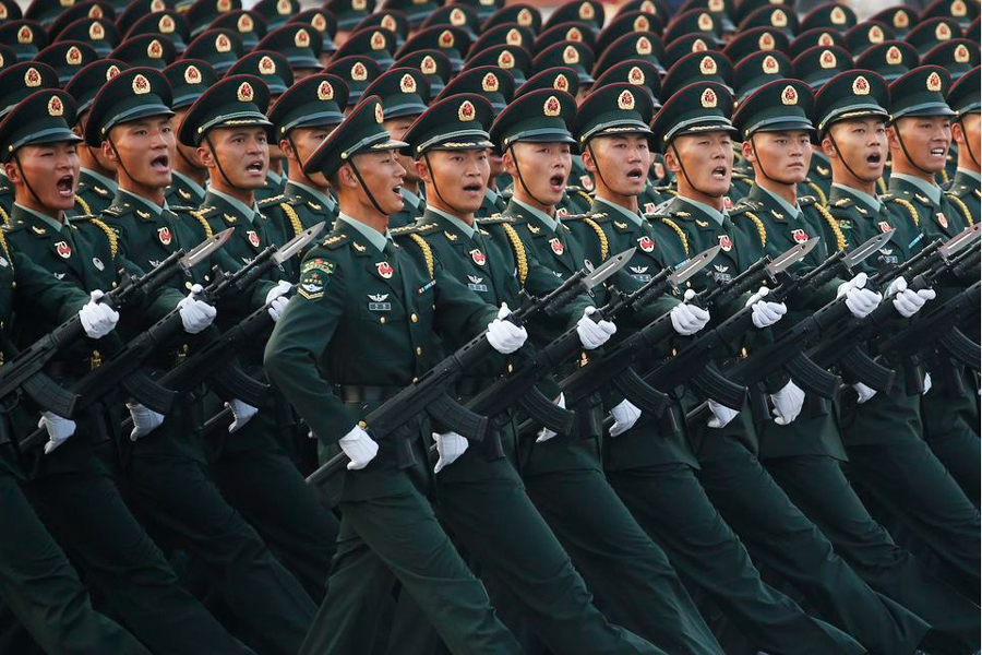 Soldiers of People's Liberation Army (PLA) march in formation past Tiananmen Square during a rehearsal before a military parade marking the 70th founding anniversary of People's Republic of China, on its National Day in Beijing, China October 1, 2019.