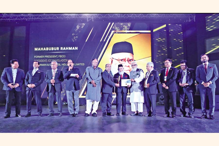 Mahbubur Rahman, president of the International Chamber of Commerce, Bangladesh (ICCB), receives Business Excellence Award under 'Jury Special' category from Prime Minister's Private Sector Industry and Investment Adviser Salman F Rahman and Industries Minister Nurul Majid Mahmud Humayun at the closing session of the Bangladesh Business Summit-2023 in Dhaka on Monday. — FE photo