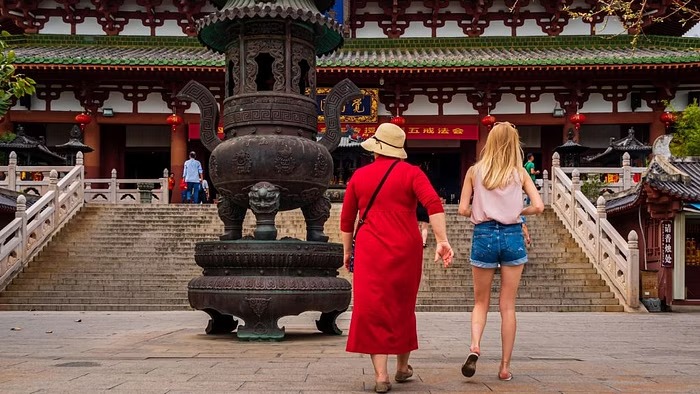 Two tourists visit Nanshan temple in Hainan, China on Mar 5, 2019.