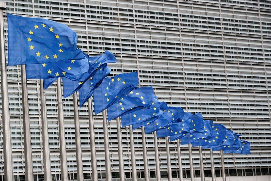 European Union flags flutter outside the EU Commission headquarters in Brussels, Belgium, July 14, 2021.
