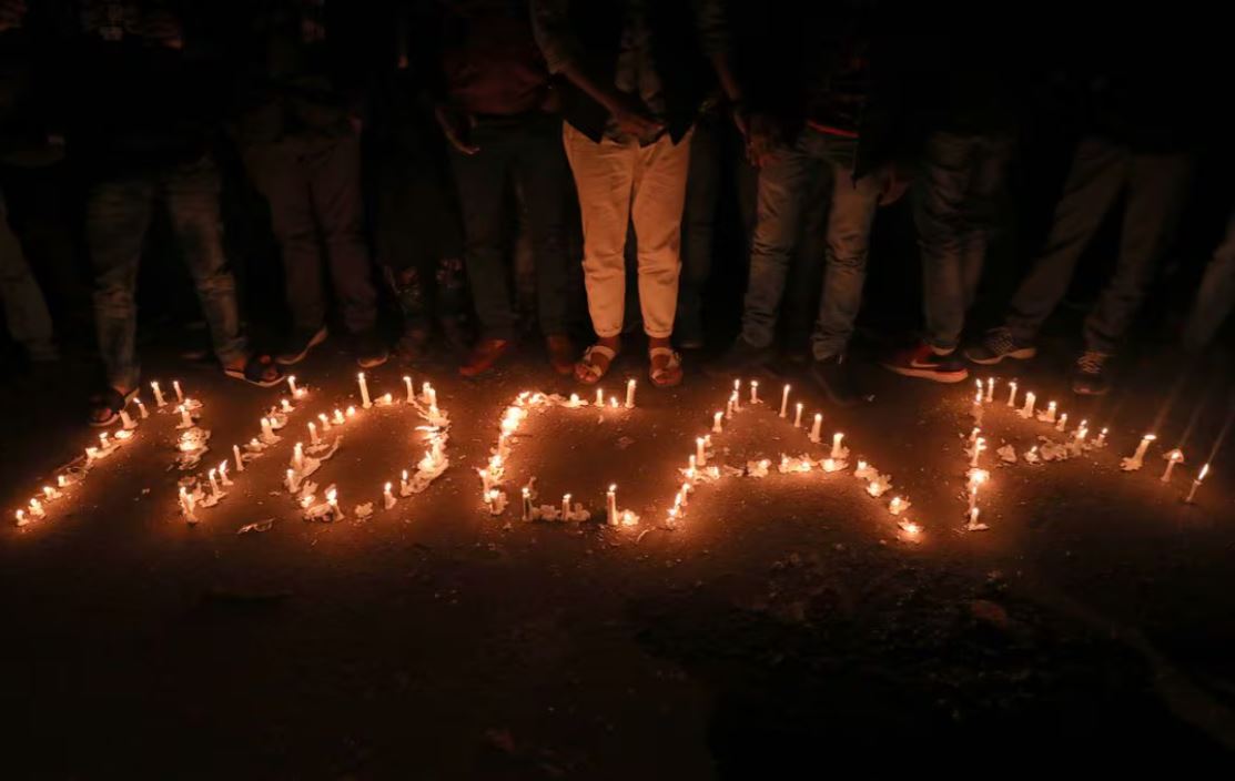 Candles spell out "No CAA" during a protest against the Citizenship Amendment Act, a new citizenship law, in New Delhi, India, December 29, 2019. REUTERS/Anushree Fadnavis/File Photo