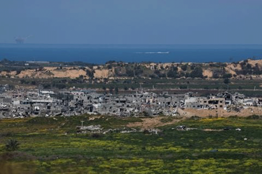 Buildings lie in ruin near the Israel-Gaza border, amid the ongoing conflict between Israel and the Palestinian group Hamas, as seen from Israel, March 11, 2024.