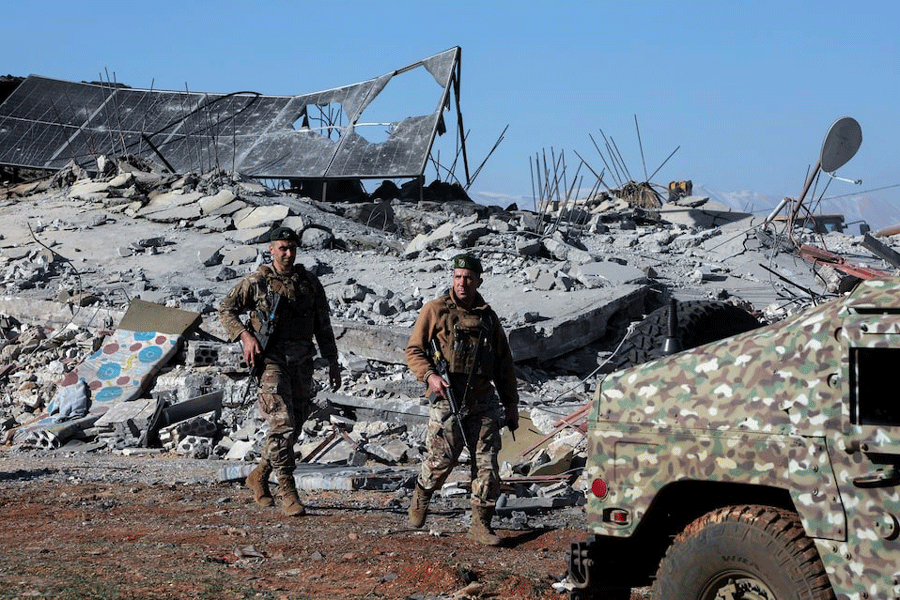 Lebanese army soldiers secure a site that was hit by a strike, after Israeli jets hit Lebanon’s Bekaa Valley for a second day on Tuesday, according to security sources, in Saraain, Lebanon March 12, 2024.