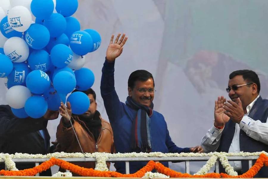 Delhi Chief Minister and leader of Aam Aadmi Party (AAP) Arvind Kejriwal waves to his supporters during celebrations at the party headquarters in New Delhi, India, February 11, 2020.