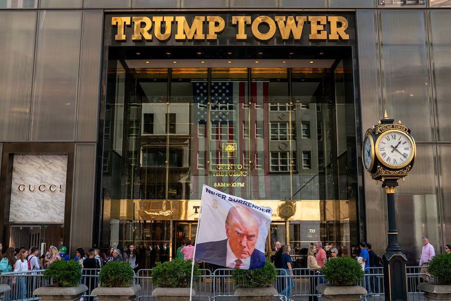 A flag depicting Donald Trump is placed at Trump Tower, October 1, 2023.