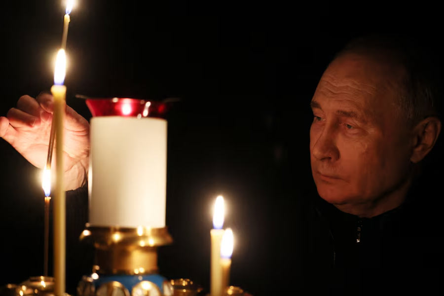 Russian President Vladimir Putin lights a candle in memory of the victims of the Crocus City Hall attack, on the day of national mourning in a church at the Novo-Ogaryovo state residence outside Moscow, Russia on Sunday -Reuters file photo