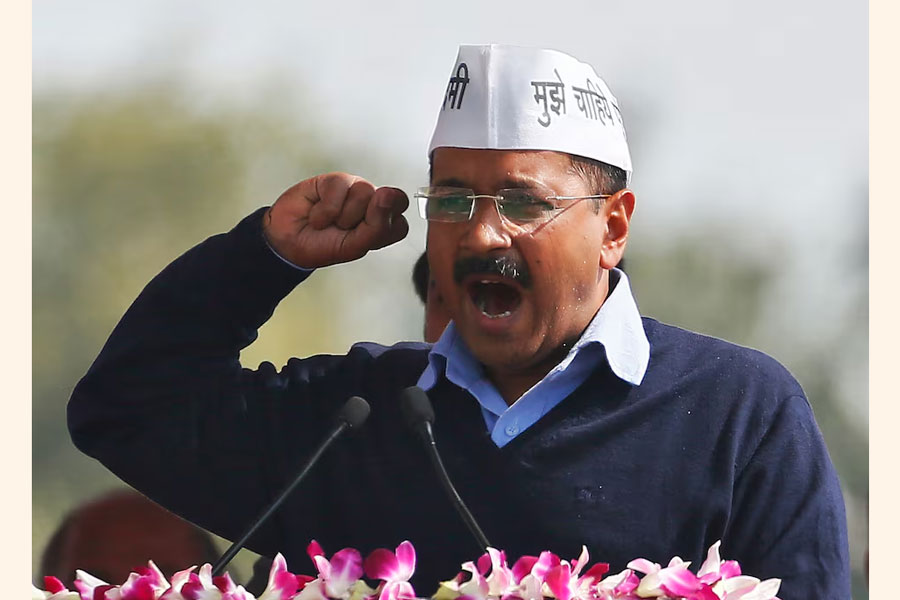Arvind Kejriwal, chief of Aam Aadmi (Common Man) Party (AAP), addresses his supporters after taking the oath as the new chief minister of Delhi during a swearing-in ceremony at Ramlila ground in New Delhi February 14, 2015.