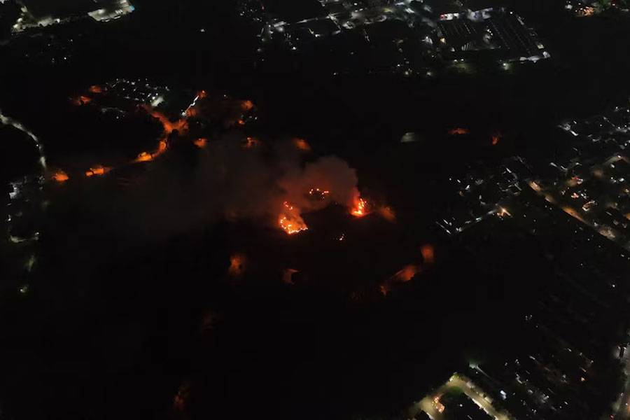 A drone view shows smoke and flames rising out of a military ammunition facility in Ciangsana, Bogor, Indonesia, March 30, 2024, in this screengrab obtained from a social media video.