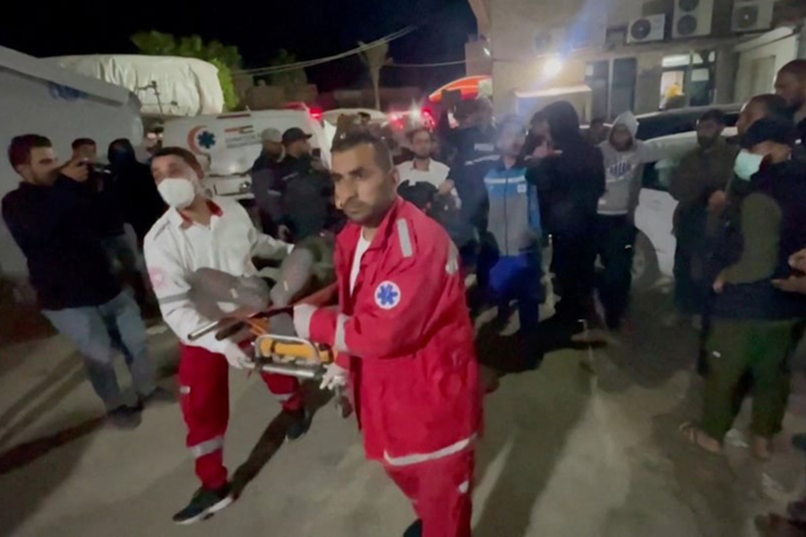 Paramedics move the body of a World Central Kitchen worker on April 1, 2024 — Video obtained by Reuters/Handout