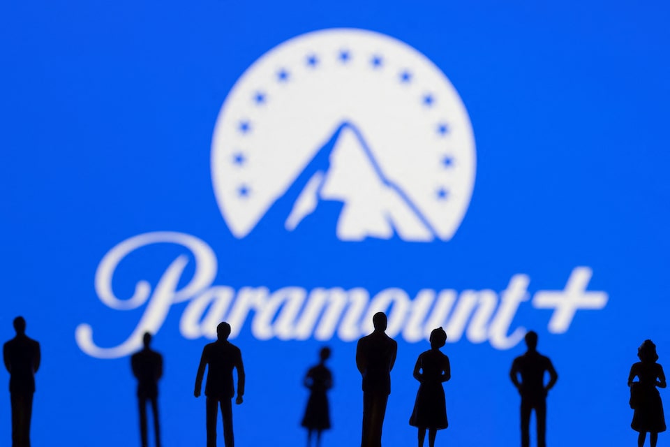 Toy figures of people are seen in front of the displayed Paramount + logo, in this illustration taken on January 20, 2022 — Reuters/File