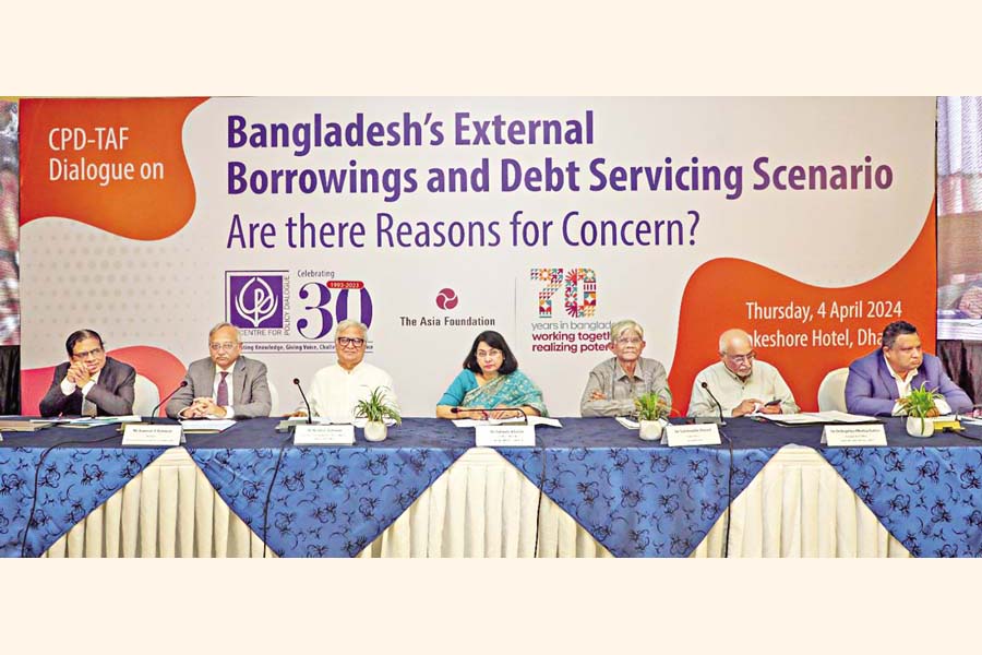 Distinguished fellow of CPD Dr Mustafizur Rahman (Extreme left), Adviser to the Prime Minister Dr Mashiur Rahman (Third from left), CPD Executive Director Dr Fahmida Khatun (Centre), Former Bangladesh Bank Governor Dr Salehuddin Ahmed (Third from right) and Distinguished fellow of the Centre for Policy Dialogue Dr Debapriya Bhattacharya (Second from right), among others, at a CPD-TAF dialogue on 'Bangladesh's External Borrowings and Debt Servicing Scenario: Are There Reasons to be Concerned?' at a city hotel on Thursday — FE photo