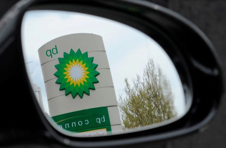 A British Petroleum (BP) logo is seen reflected in a car mirror at a petrol station in south London April 27, 2010. REUTERS/Toby Melville/File Photo