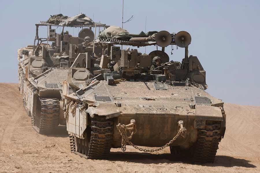 Israeli armoured personnel carriers (APC) manoeuvre, near the Israel-Gaza border, amid the ongoing conflict between Israel and the Palestinian Islamist group Hamas, in Israel, on Monday –Reuters photo