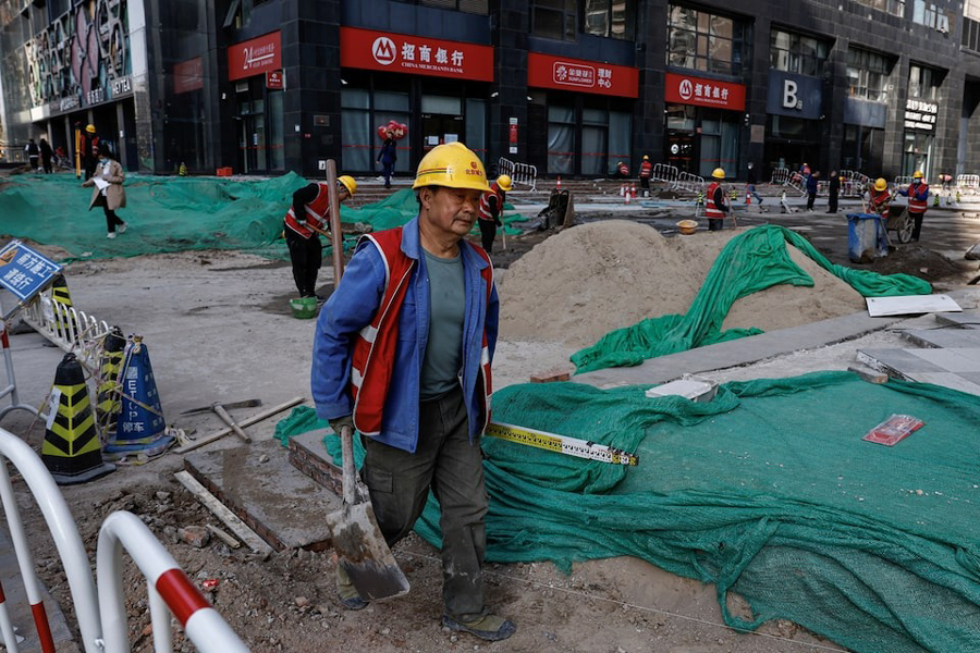 A worker labours at a construction site in Beijing, China April 9, 2024.