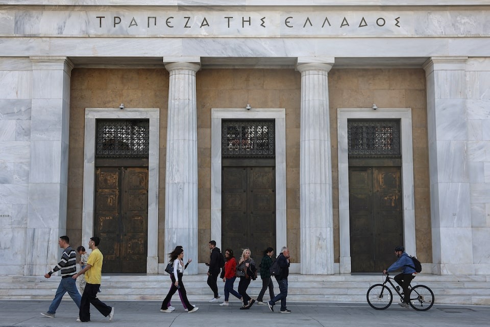 People walk in front of Bank of Greece in central Athens, Greece on April 12, 2024 — Reuters photo