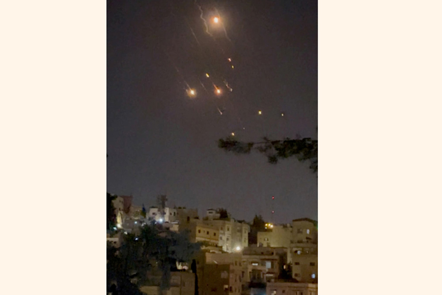 Objects are seen in the sky over Amman after Iran launched drones towards Israel, in Amman, Jordan, April 14 —Reuters