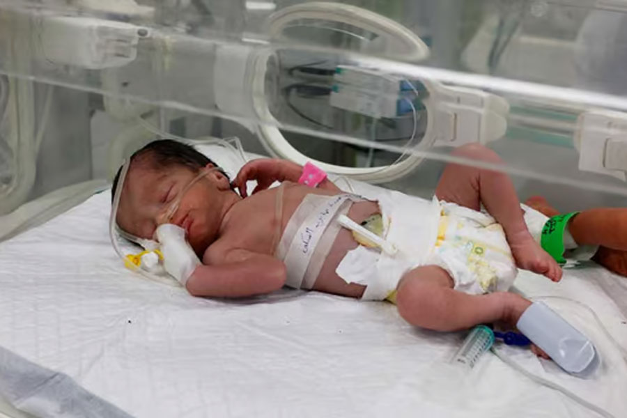 A Palestinian baby girl, saved from the womb of her mother Sabreen Al-Sheikh (Al-Sakani), who was killed in an Israeli strike along with her husband Shokri and her daughter Malak, lies in an incubator at Al-Emirati hospital in Rafah in the southern Gaza Strip April 21, 2024.