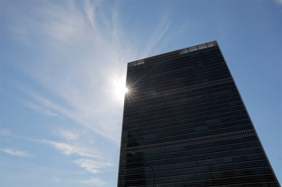 The sun shines behind the United Nations Secretariat Building at the United Nations Headquarters, in New York City, New York, US, June 18, 2021. REUTERS