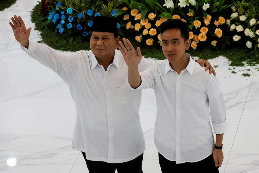 Indonesia's president-elect Prabowo Subianto and vice president-elect Gibran Rakabuming Raka waving after the country's election commission officially announced them as the presidential election winners at General Election Commission (KPU) headquarters in Jakarta on Wednesday –Reuters photo