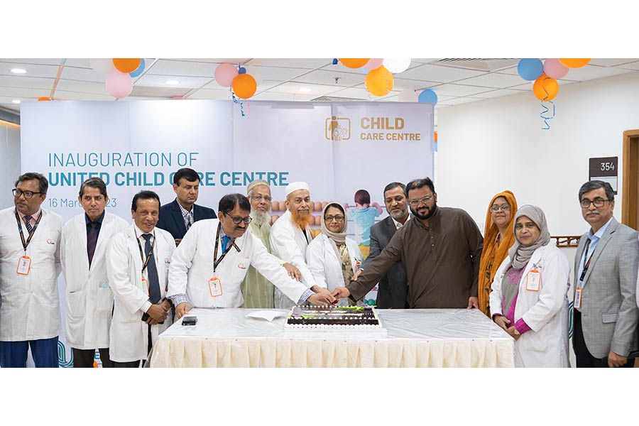 High-ups, doctors and other officials of United Hospital Limited cutting a cake at the inaugural programme of United Child Care Unit at the hospital in the city on Thursday –Press release photo