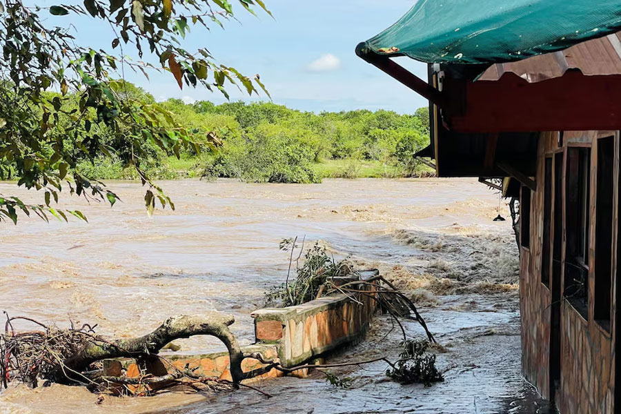 View of a swollen river near a safari lodge following heavy rainfall in the Talek region, of the Maasai Mara National Reserve in Narok County, Kenya May 1, 2024.
