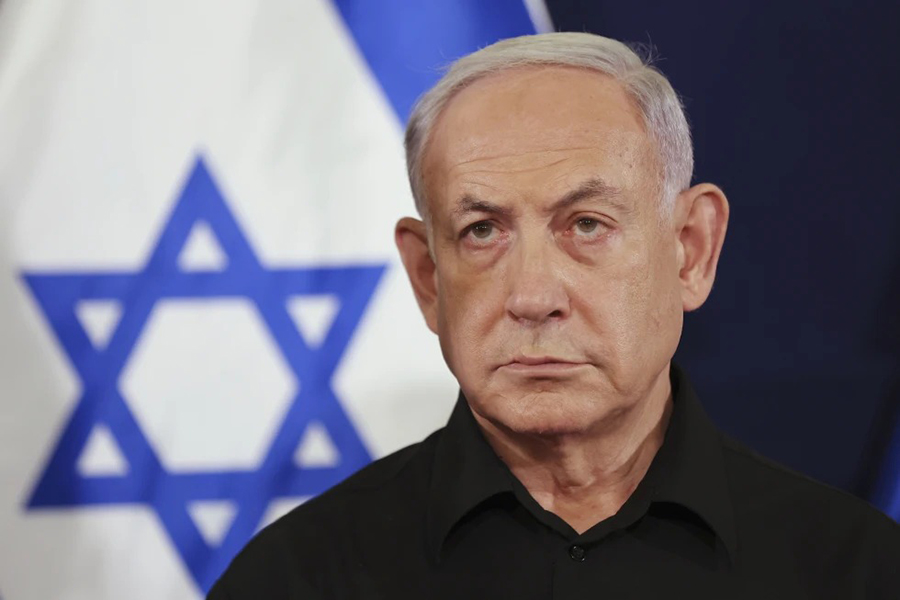 Israeli Prime Minister Benjamin Netanyahu attends a press conference in the Kirya military base in Tel Aviv, Israel on October 28, 2023 — Pool via AP/File