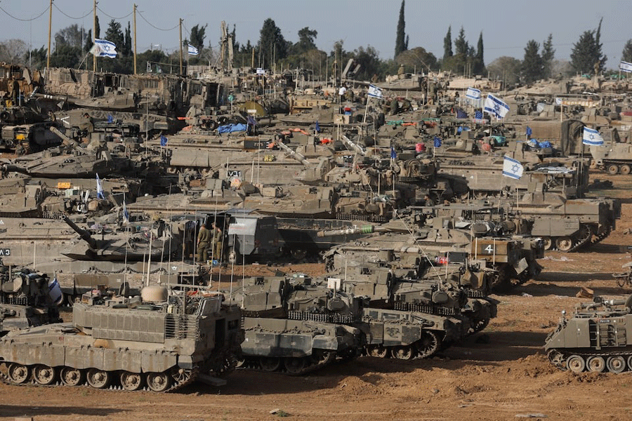 Israeli military vehicles are seen near the Israel-Gaza Border, amid the ongoing conflict between Israel and the Palestinian Islamist group Hamas, in southern Israel, May 9, 2024.