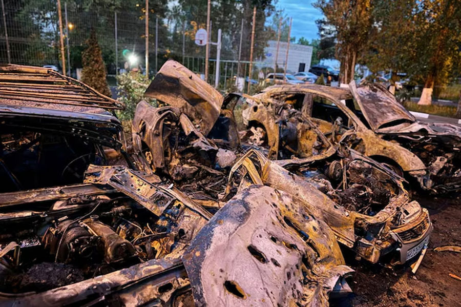 A view shows damaged vehicles at the site of a recent military strike, what local authorities called a Ukrainian air attack, in the course of the Russia-Ukraine conflict, in a location given as Belgorod, Russia, in this handout image released on May 11, 2024.