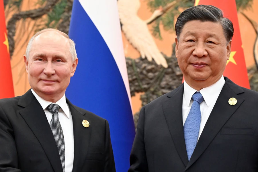 Chinese President Xi Jinping, right, and Russian President Vladimir Putin pose for a photo prior to their talks on the sidelines of the Belt and Road Forum in Beijing, China, on Wednesday, Oct. 18, 2023. President Putin will make a two-day state visit to China this week, the Chinese Foreign Ministry said Tuesday, May 14, 2024.