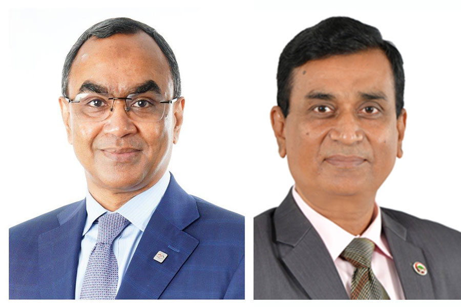 Syed Mahbubur Rahman, Managing Director & CEO of Mutual Trust Bank PLC (on the left) and Mohammad Jahangir, Managing Director and CEO of Rupali Bank PLC