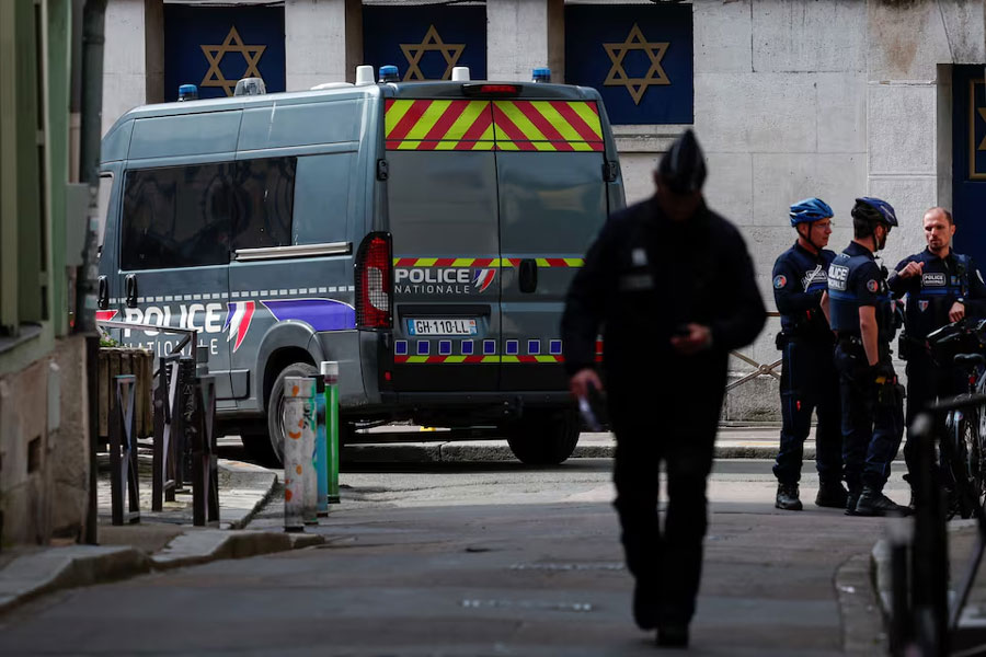 Police officers work after police shot dead an armed man earlier who set fire to the city's synagogue in Rouen, France, May 17, 2024.