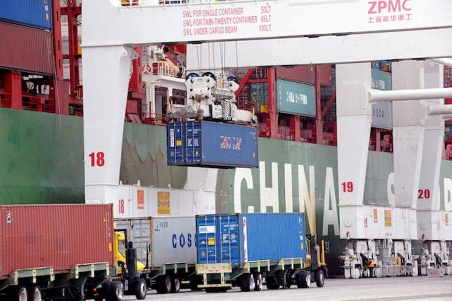 Shipping containers at Pier J at the Port of Long Beach wait for processing in Long Beach, California, US, April 4, 2018.