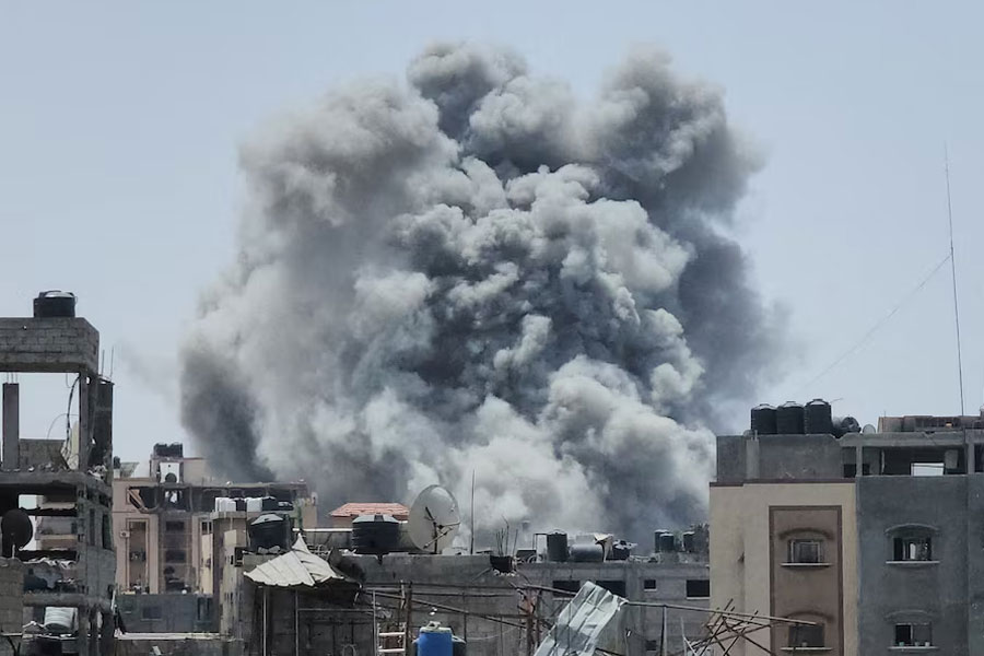 Smoke rises following an Israeli strike, amid the ongoing conflict between Israel and the Palestinian Islamist group Hamas, in Jabalia refugee camp in the northern Gaza Strip, May 18, 2024.