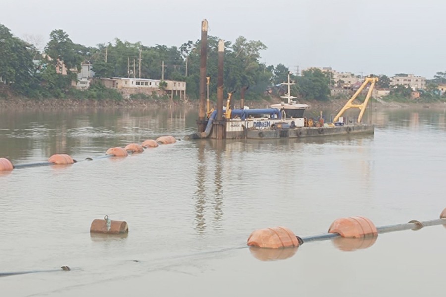 Dredging work going on in the Surma River in Sylhet city