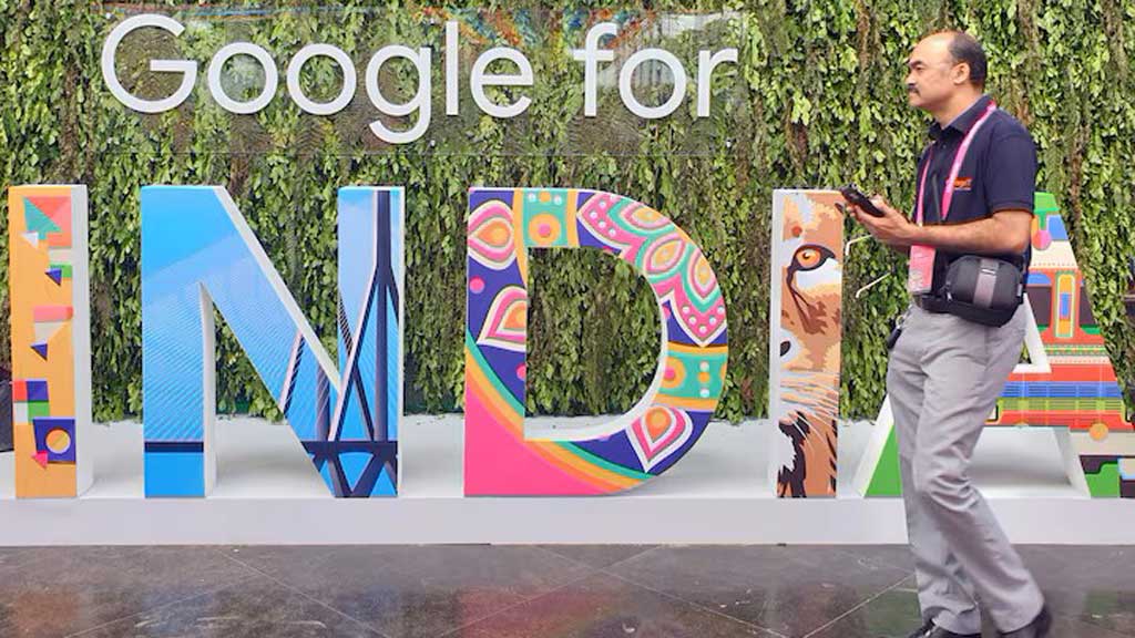 A man walks past the sign of "Google for India", the company's annual technology event in New Delhi, India, September 19, 2019. REUTERS
