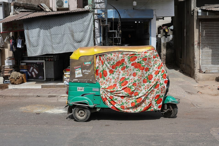 An autorickshaw covered with a cloth is seen on the street during a heat wave in Ahmedabad, India on May 30, 2024 — Reuters photo