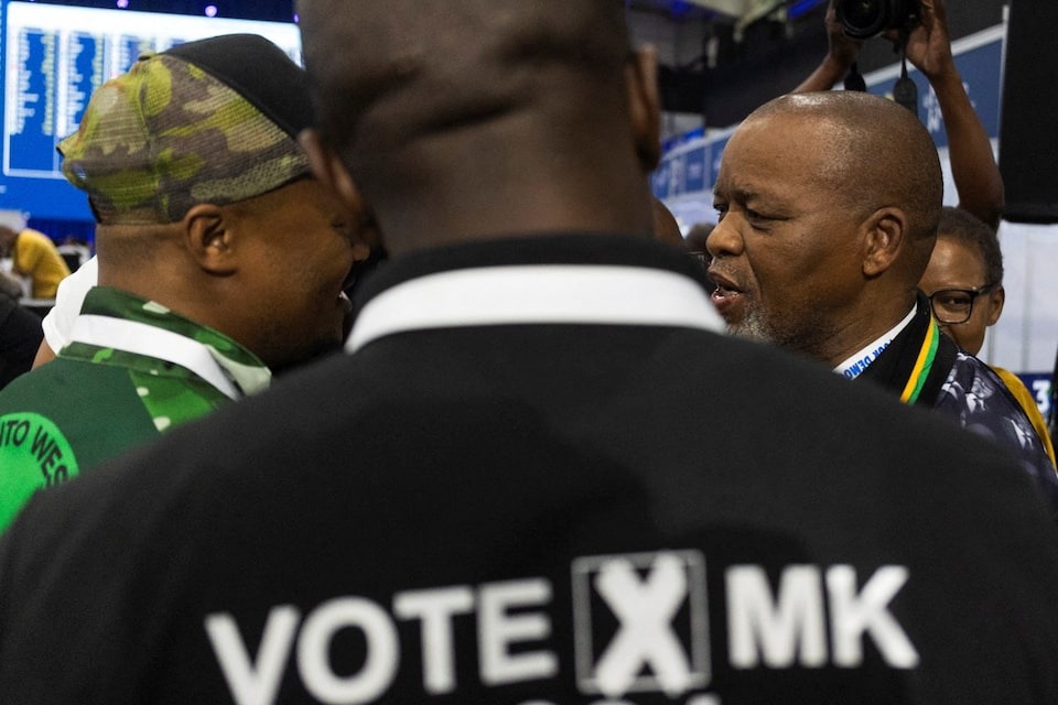 National chairperson of the African National Congress Gwede Mantashe speaks with members of uMkhonto we Sizwe (MK) party at the National Results Operation Centre of the Electoral Commission of South Africa (IEC), which serves as an operational hub where results of the national election are displayed, in Midrand, South Africa on May 31, 2024 — Reuters photo