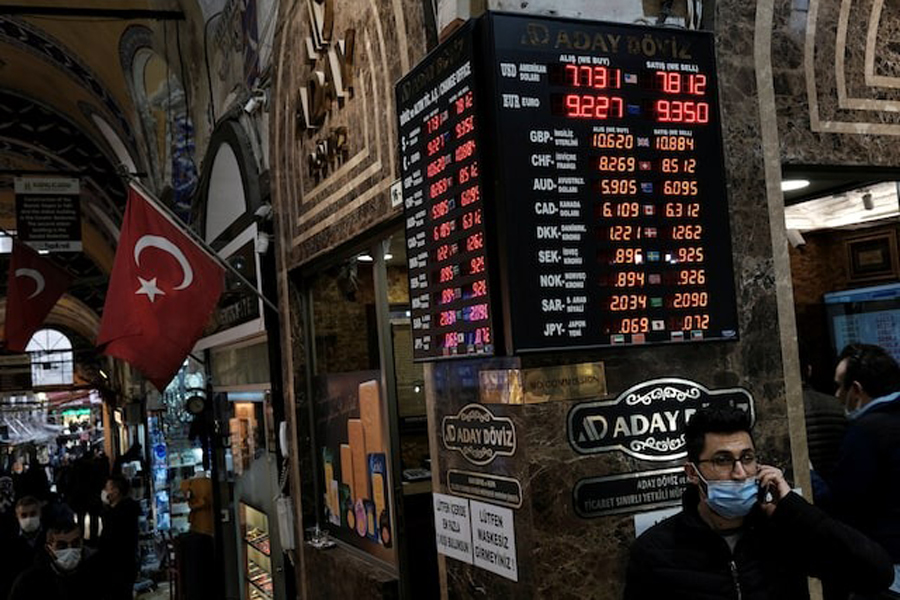 A board shows the currency exchange rates outside an exchange office in Istanbul, Turkey March 22, 2021.