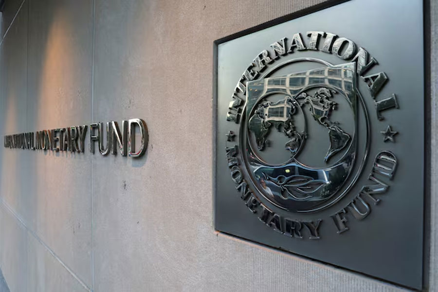 International Monetary Fund (IMF) logo is seen outside the headquarters building in Washington, U.S., as IMF Managing Director Christine Lagarde meets with Argentine Treasury Minister Nicolas Dujovne September 4, 2018.