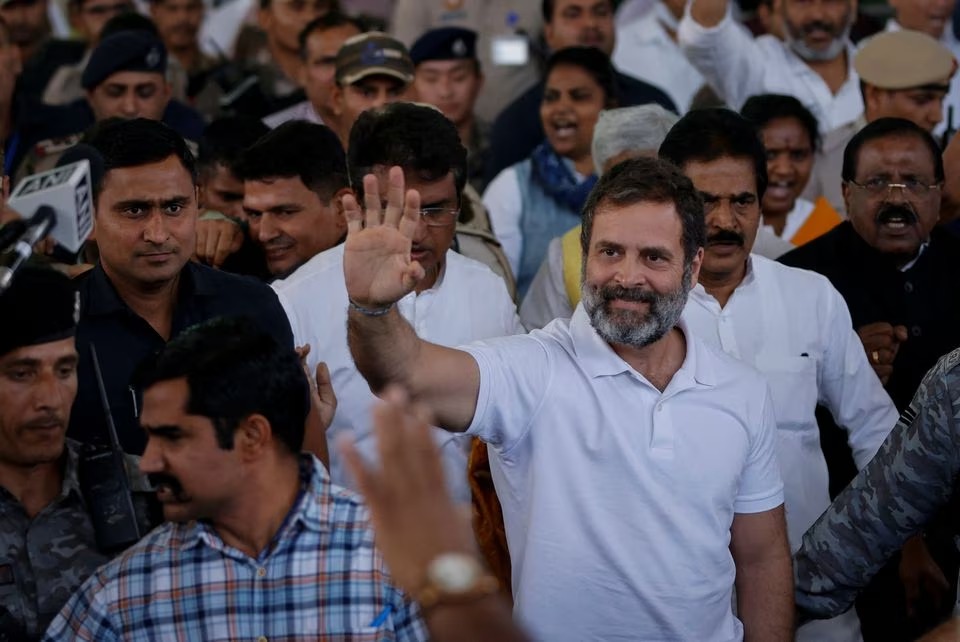 Rahul Gandhi, a senior leader of India's main opposition Congress party, waves towards his party workers as he arrives at the New Delhi airport, after he appeared before a court in Surat in the western state of Gujarat, India on March 23, 2023 — Reuters photo