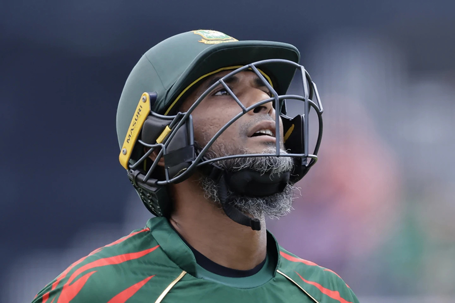 Bangladesh's Mahmudullah Riyad reacts as he walks off the field after losing his wicket during the ICC Men's T20 World Cup cricket match between Bangladesh and South Africa at the Nassau County International Cricket Stadium in Westbury, New York on Monday, June 10, 2024 — AP photo