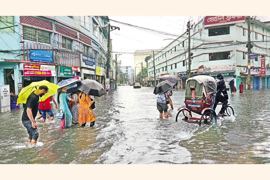 Incessant downpour left different neighbourhoods of Sylhet city submerged on Wednesday